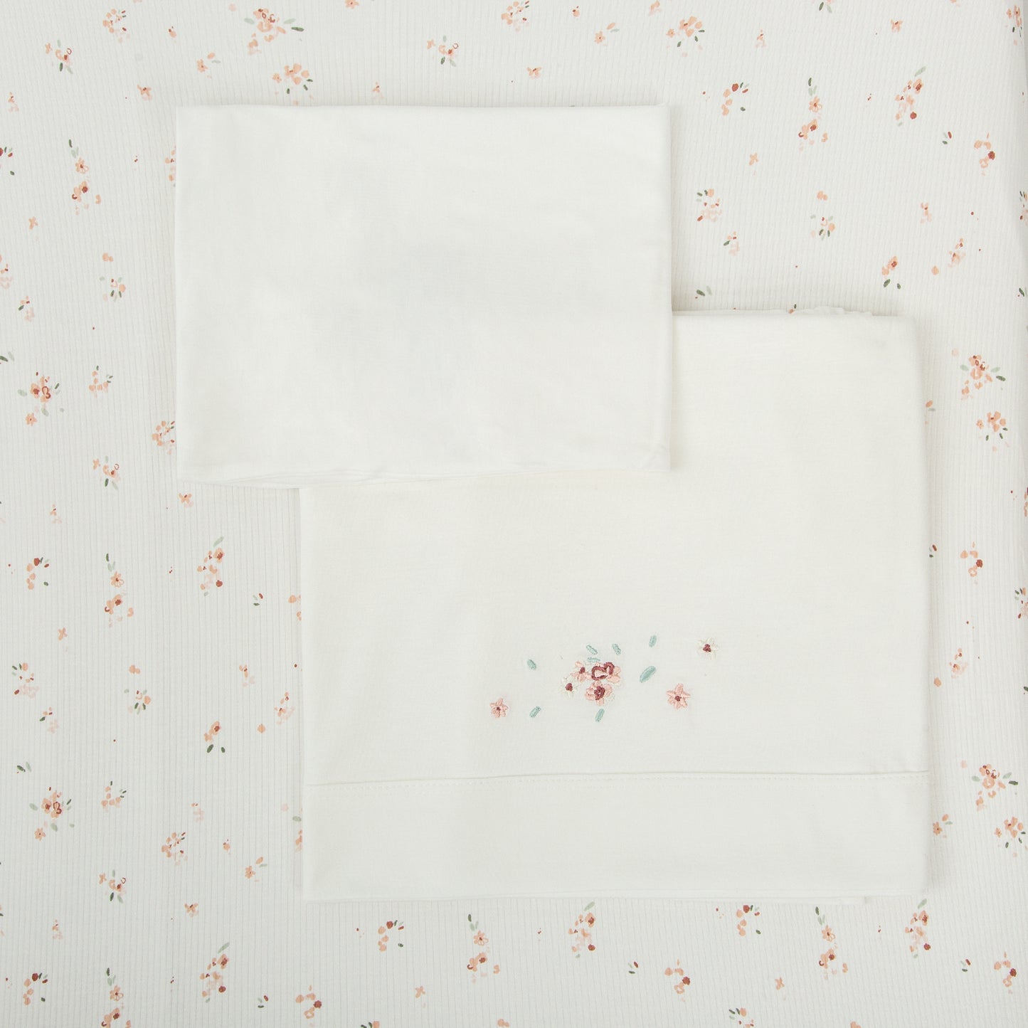 Juego sabanas punto jersey 3 piezas Monet Blanco Rosa Maxicuna (70x140)