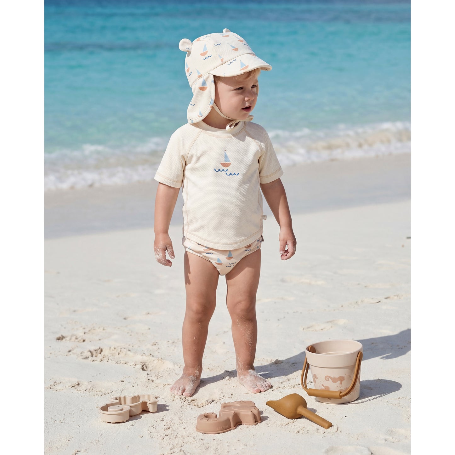 Gorra con protección solar Calypso Blanco Azul 3-12m