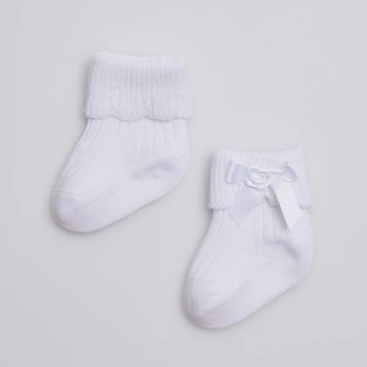 Calcetines canalé con lazo recién nacido blanco Ysabel Mora