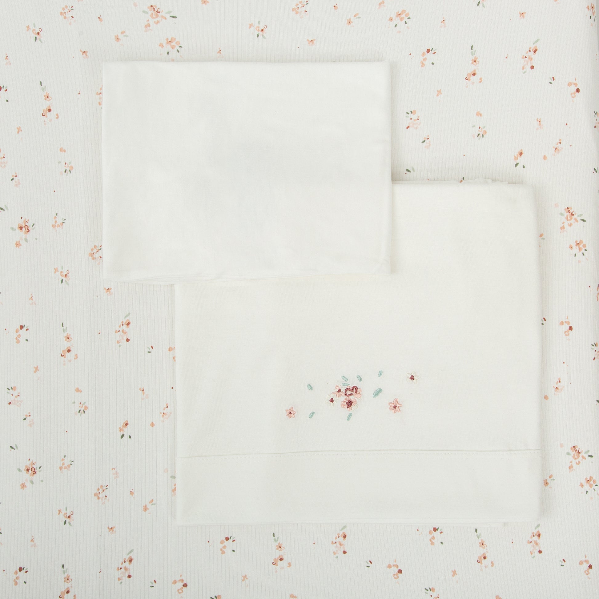 Juego sabanas punto jersey 3 piezas Monet Blanco Rosa Maxicuna (70x140)